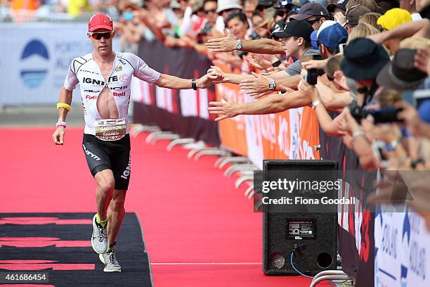 Cameron Brown of New Zealand finishes in third place at Ironman 70.0 on January 18, 2015 in Auckland, New Zealand.