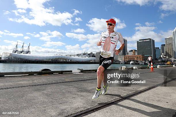 Cameron Brown of New Zealand runs along Princes Wharf during Ironman 70.0 on January 18, 2015 in Auckland, New Zealand.