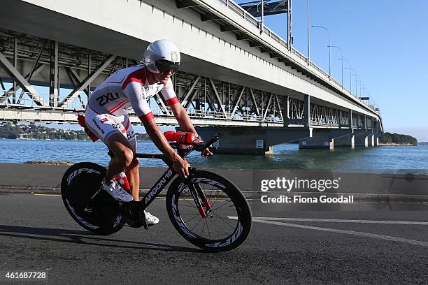 Terenzo Bozzone of New Zealand cycles under the Auckland Harbour Bridge during Ironman 70.0 on January 18, 2015 in Auckland, New Zealand.