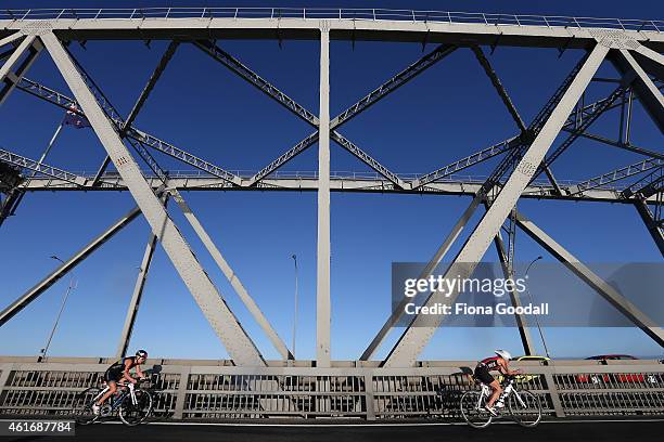 Cyclists head over Auckland Harbour Bridge during Ironman 70.0 on January 18, 2015 in Auckland, New Zealand.