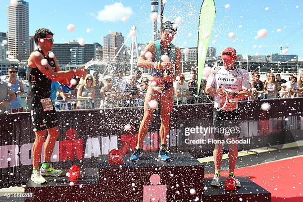Elite Men's top three Leon Griffin in second, Tim Reed both of Australia in first place and Cameron Brown of New Zealand in third at Ironman 70.0 on...