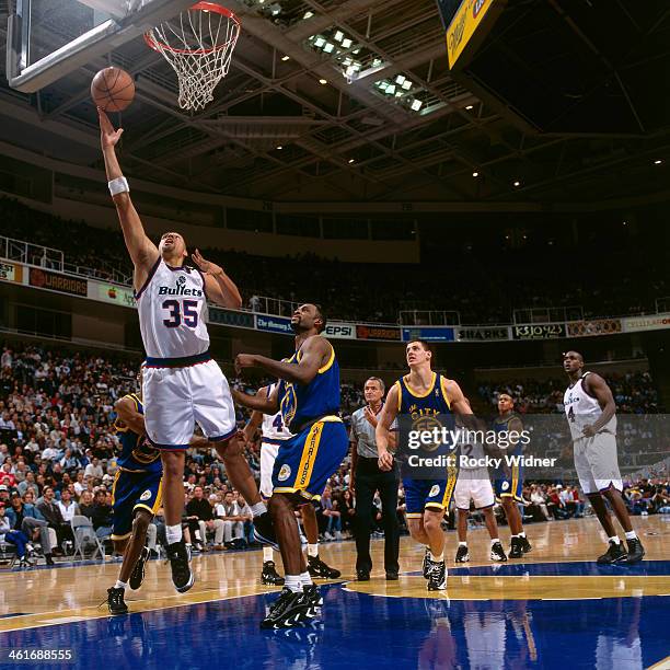 Tracy Murray of the Washington Bullets shoots the ball against the Golden State Warriors during a game played on December 15, 1996 at the San Jose...