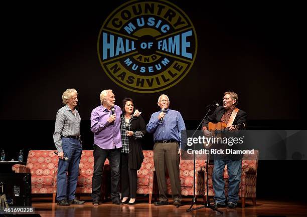 Musicians Gene Lorenzo, Kenny Rogers, Mary Arnold Miller, Mike Settle, and Terry Williams speak during a panel discussion with Kenny Rogers and the...