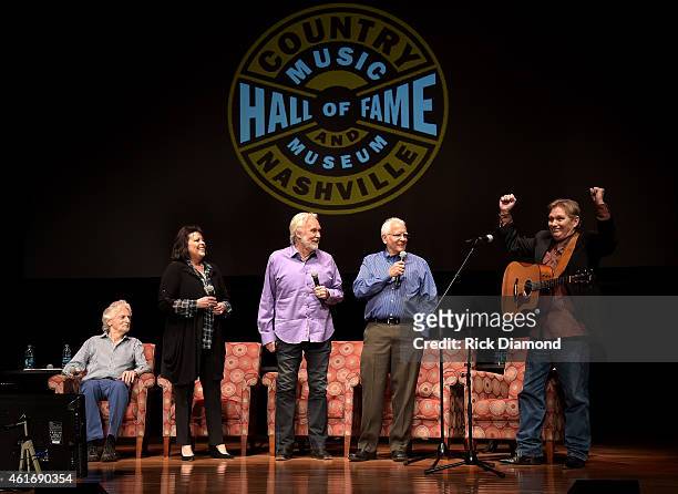 Musicians Gene Lorenzo, Mary Arnold Miller, Kenny Rogers, Mike Settle, and Terry Williams speak during a panel discussion with Kenny Rogers and the...