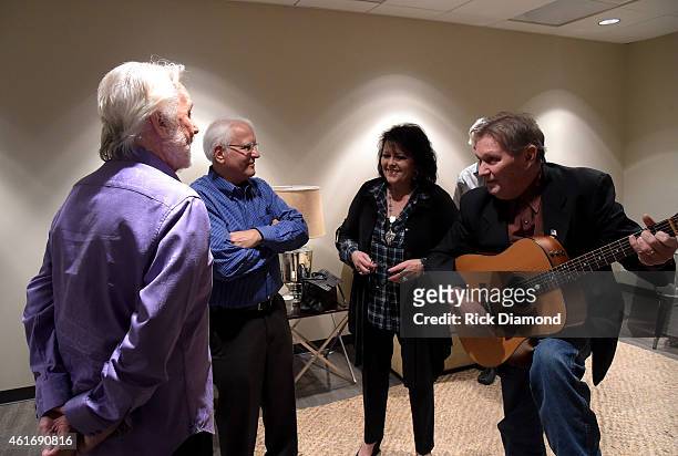 Musicians Kenny Rogers, Mike Settle, Mary Arnold Miller, and Terry Williams perform backstage during a panel discussion with Kenny Rogers and the...