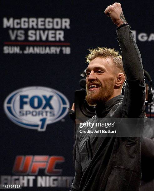 Conor 'The Notorious' McGregor of Ireland interacts with the crowd after the UFC Fight Night Boston weigh-in event at the Orpheum Theatre on January...