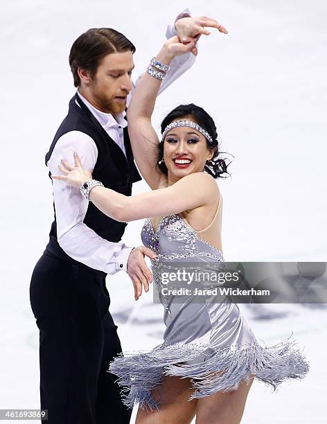 Lynn Kriengkrairut and Logan Giulietti-Schmitt skate in the short dance program during the 2014 Prudential U.S. Figure Skating Championships at TD...