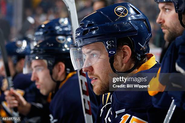 Linus Omark of the Buffalo Sabres watches the action against the Washington Capitals on December 29, 2013 at the First Niagara Center in Buffalo, New...