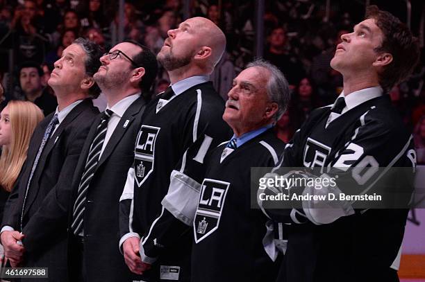 Dean Lombardi, Dan Beckerman, Matias Nordstrom, Rogie Vachon, and Luc Robitaille watch a commemorative video during Rob Blake's retirement ceremony...