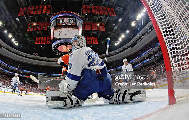 Evgeni Nabokov of the Tampa Bay Lightning tends goal against the Philadelphia Flyers on January 12, 2015 at the Wells Fargo Center in Philadelphia,...