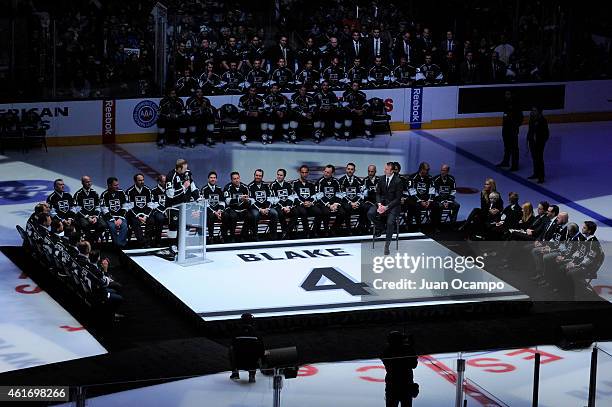 Dustin Brown of the Los Angeles Kings speaks during Rob Blake's jersey retirement ceremony before a game between the Los Angeles Kings and the...