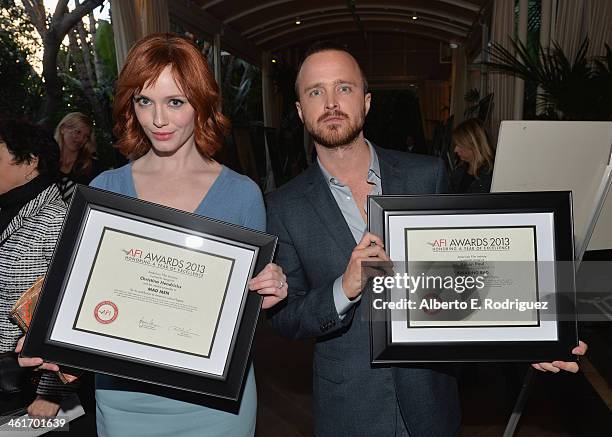 Honorees Christina Hendricks and Aaron Paul attend the 14th annual AFI Awards Luncheon at the Four Seasons Hotel Beverly Hills on January 10, 2014 in...