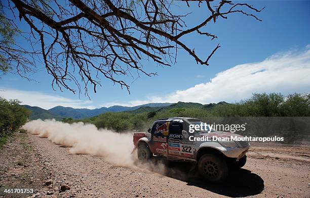 Adam Malysz and Rafal Marton of Poland for Proto Overdrive Toyota compete during Day 6 of the 2014 Dakar Rally on January 10, 2014 near Embalse Cabra...