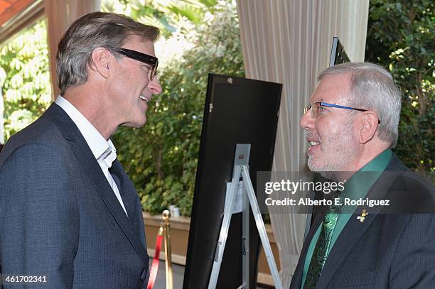 Director John Lee Hancock and film critic Leonard Maltin attend the 14th annual AFI Awards Luncheon at the Four Seasons Hotel Beverly Hills on...