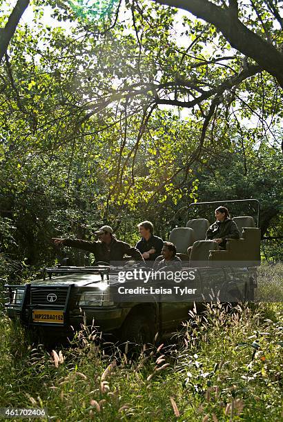 Naturalist Karan Modi spotting wildlife for guests of Mahua Kothi, a safari lodge on the edge of Baghavahn National Park. Opened in late 2006, Mahua...