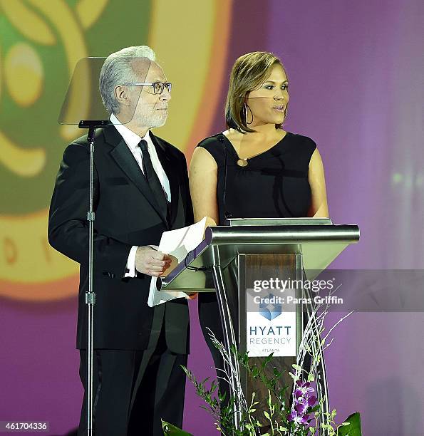 Wolf Blitzer and Jovita Moore onstage at "Salute To Greatness" Awards Dinner at The Hyatt Regency Atlanta on January 17, 2015 in Atlanta, Georgia.