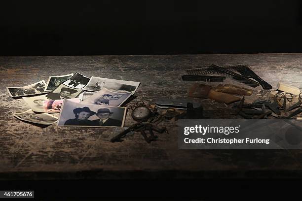 Small selection of the personal photographs and belongings taken from prisoners as they arrived at the Auschwitz II Birkenau extermination camp are...