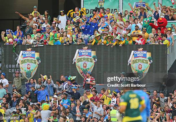 Spectators in fancy dress including Elmo and Gumby watch the match from the crowd during the One Day International match between Australia and India...