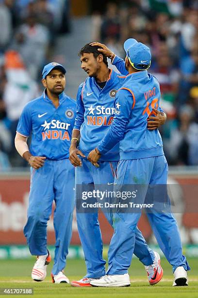 Axar Patel of India is congratulated by team mates after taking the wicket of Shane Watson of Australia during the One Day International match...