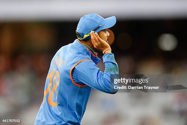Virat Kohli of India gestures to the fans during the One Day International match between Australia and India at Melbourne Cricket Ground on January...