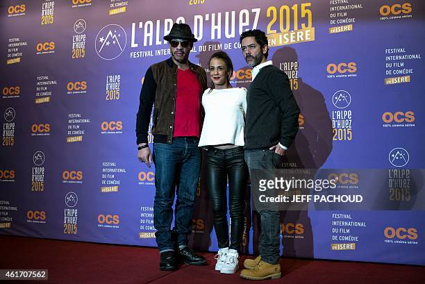 French actors Didier Morville aka Joeystarr, Alice Belaidi, and Manu Payet pose on January 17, 2015 during the 18th Comedy film festival in L'Alpe...