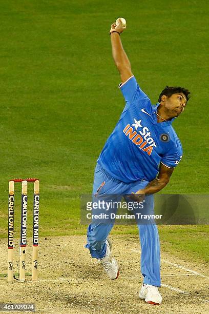 Umesh Yadav of India bowls during the One Day International match between Australia and India at Melbourne Cricket Ground on January 18, 2015 in...