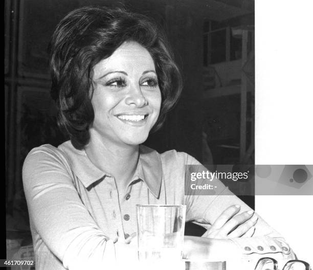 Egyptian film star Faten Hamama poses for a picture at a Beirut restaurant during the filming of one of her films in the Lebanese capital in the...