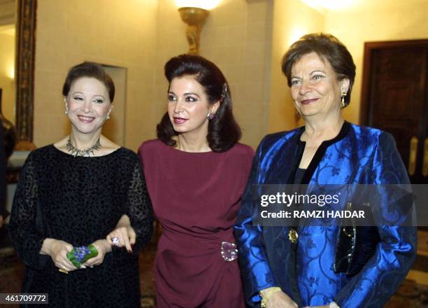 Egyptian actress Faten Hamama, Nazek al-Hariri, wife of Lebanese PM Rafiq al-hariri, and Lebanon's first lady Andree Lahoud pose for a picture at...