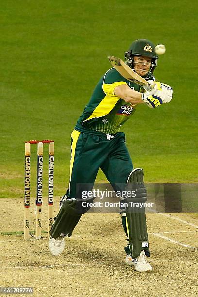 Steve Smith of Australia plays a shot and is caught by Ravichandran Ashwin of India during the One Day International match between Australia and...