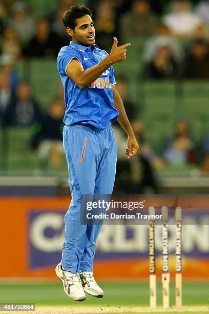 Bhuvneshwar Kumar of India celebrates taking the wicket of Glenn Maxwell of Australia during the One Day International match between Australia and...