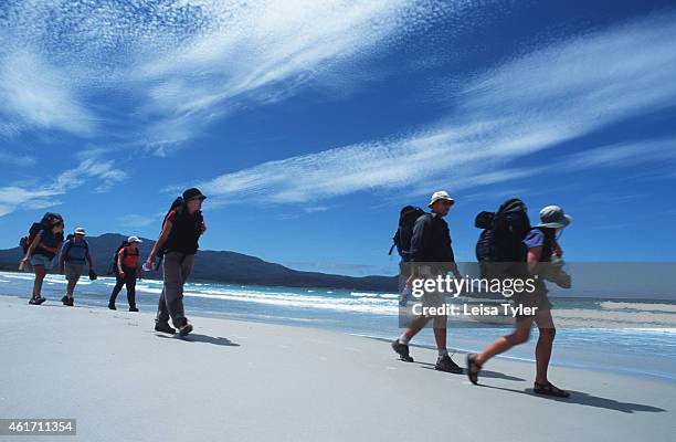 Guests on the Maria Island Walk traverse one of the most southern beaches of Maria Island to their night's camp. The latest trend on the Tasmanian...