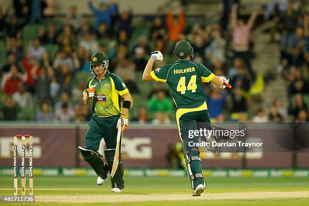 James Faulkner of Australia celebrates hitting the winning run during the One Day International match between Australia and India at Melbourne...