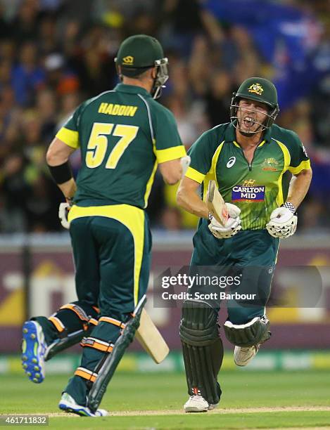 James Faulkner of Australia celebrates as he hits the winning runs during the One Day International match between Australia and India at the...