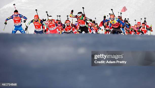 Darya Domracheva of Belarus and Kaisa Makarainen of Finland lead the pack during the IBU Biathlon World Cup Women's Mass Start on January 18, 2015 in...