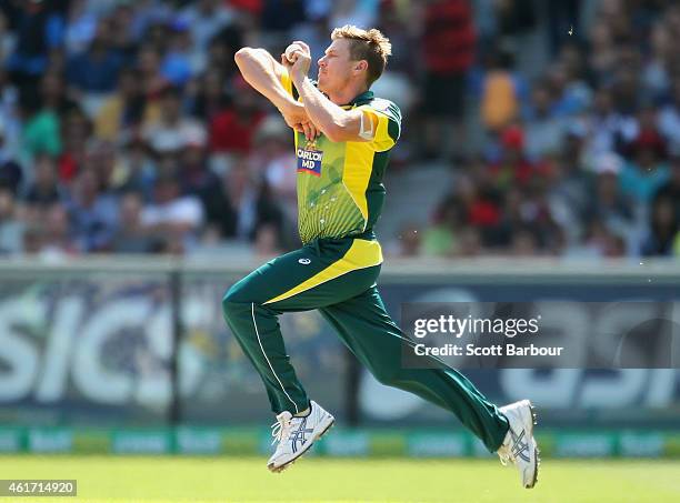 James Faulkner of Australia bowls during the One Day International match between Australia and India at the Melbourne Cricket Ground on January 18,...