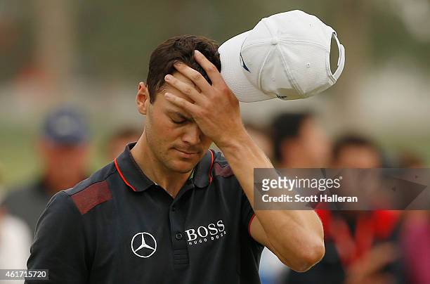 Martin Kaymer of Germany waits on the 18th green during the final round of the Abu Dhabi HSBC Golf Championship at the Abu Dhabi Golf Cub on January...