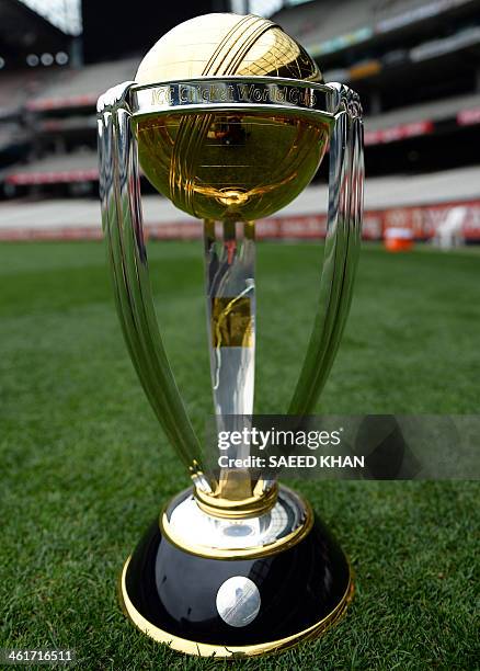 The ICC Cricket World Cup trophy is displayed at the Melbourne Cricket Ground on January 11, 2014. Australia and New Zealand will host the cricket...