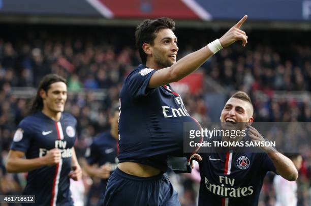 Paris Saint-Germain's Argentinian midfielder Javier Pastore gestures as he celebrates after scoring a goal with Paris Saint-Germain's Italian...