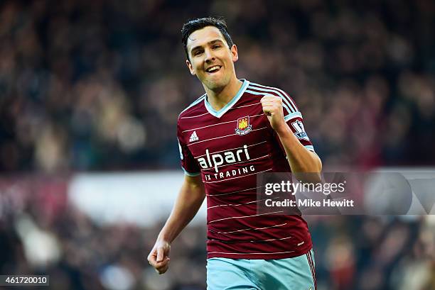Stewart Downing of West Ham United celebrates as he scores their third goal during the Barclays Premier League match between West Ham United and Hull...