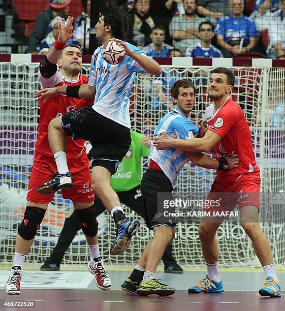 Argentina's Federico Vieyra takes a shot on goal during the 24th Men's Handball World Championships preliminary round Group D match between Argentina...