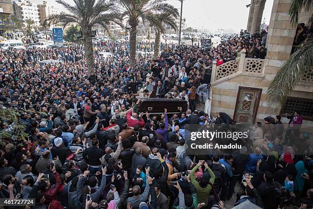 People carry the coffin of Egyptian actress Faten Hamama, died at the age of 84, in 6th of October City of Cairo, Egypt on January 18, 2015.