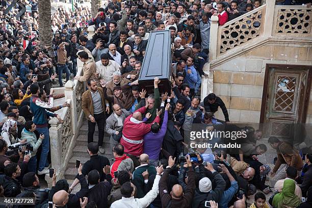 People carry the coffin of Egyptian actress Faten Hamama, died at the age of 84, in 6th of October City of Cairo, Egypt on January 18, 2015.
