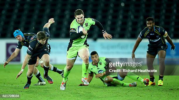 George North of Saints breaks away to score the second try during the European Rugby Champions Cup match between Ospreys and Northampton Saints at...
