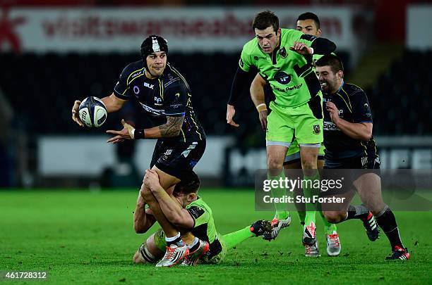 Ospreys centre Josh Matavesi makes a break during the European Rugby Champions Cup match between Ospreys and Northampton Saints at Liberty Stadium on...