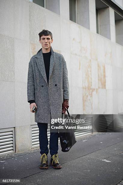 Thomas Gibbons poses wearing a Topman coat during day 2 of Milan Menswear Fashion Week Fall/Winter 2015/2016 on January 18, 2015 in Milan, Italy.