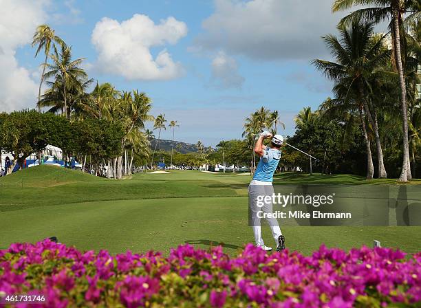 Jimmy Walker plays his shot from the tenth tee during the third round of the Sony Open In Hawaii at Waialae Country Club on January 17, 2015 in...