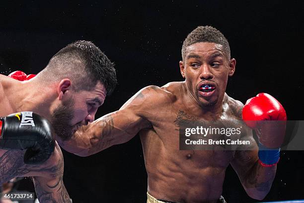 Willie Monroe, Jr. Throws a right at Bryan Vera during the 6th round of their Middleweight Championship match during ESPN's Friday Night Fights on...