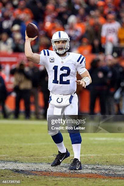 Andrew Luck of the Indianapolis Colts passes during the game against the Denver Broncos during the 2015 AFC Divisional Playoff game at Sports...