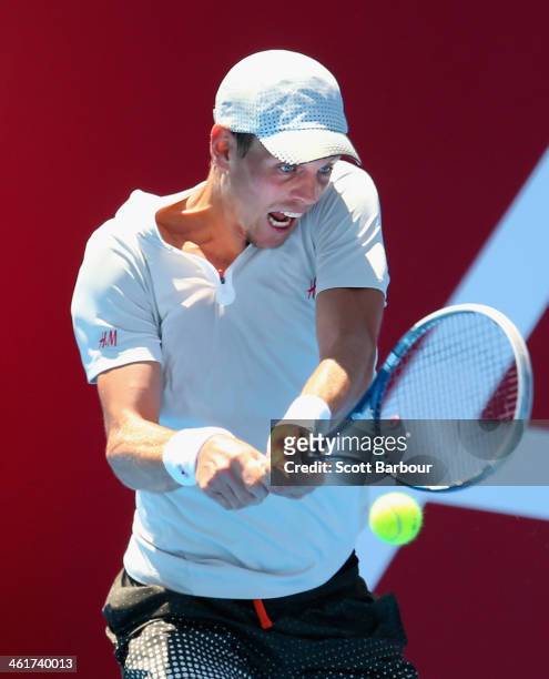 Tomas Berdych of the Czech Republic plays a backhand during his match against Kei Nishikori of Japan during day four of the AAMI Classic at Kooyong...