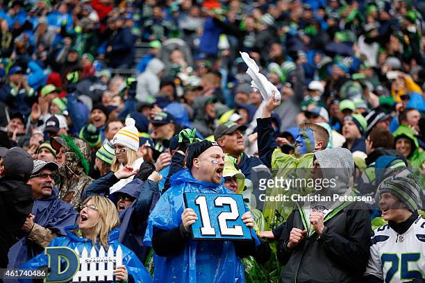 Seattle Seahawks fans celebrate during the second half of the 2015 NFC Championship game against the Green Bay Packers at CenturyLink Field on...